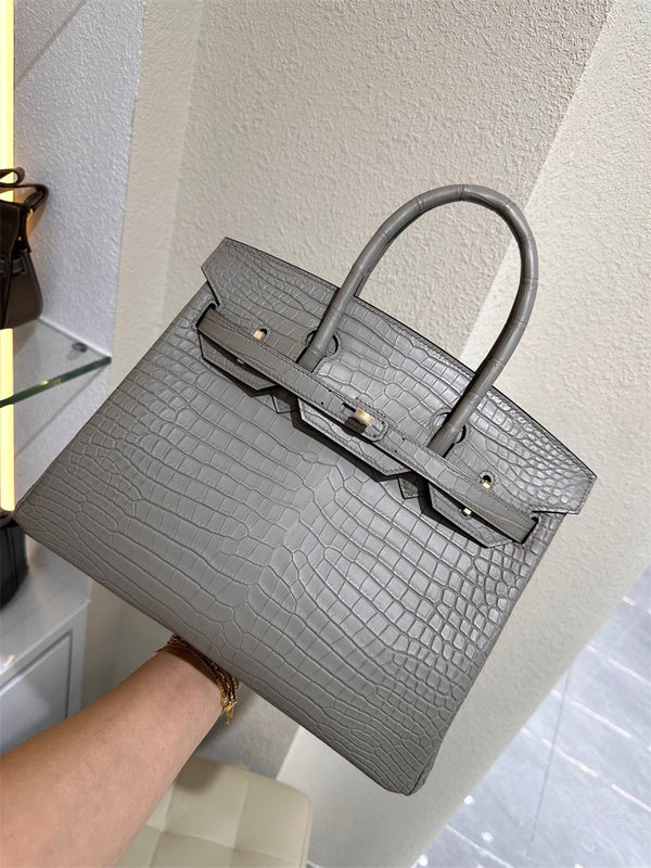  Refined carryall bag carried on shoulder 28