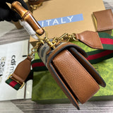 Handle and strap detail of everyday-luxe elevated women's handbag – women's statement bag