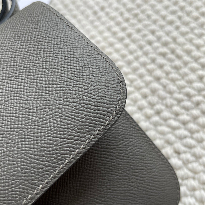 Side view of poised structured handbag