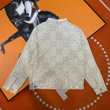 Close-up detail shot of Gucci luxury clothing with logo-detail design