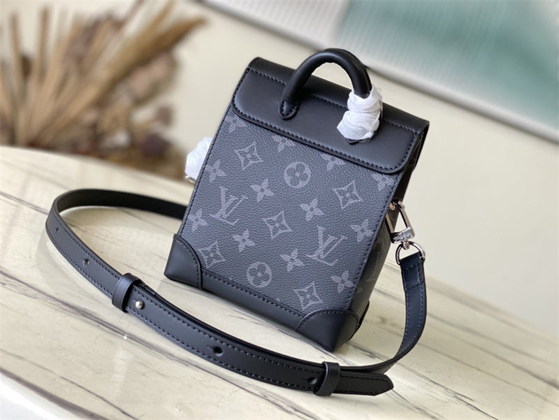  Polished top-handle bag carried on shoulder