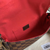 Styled lifestyle shot of modern classic women's handbag – women's statement bag