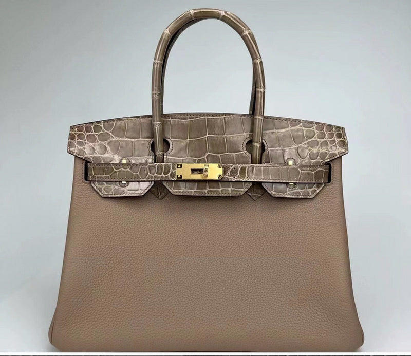 Side view of chic structured handbag