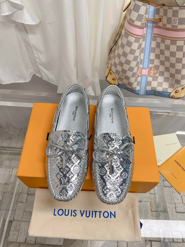 Louis Vuitton White Low-Top Sneakers - Angled View