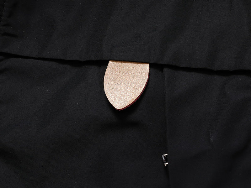 Front view of Louis Vuitton luxury clothing with monogram-inspired silhouette