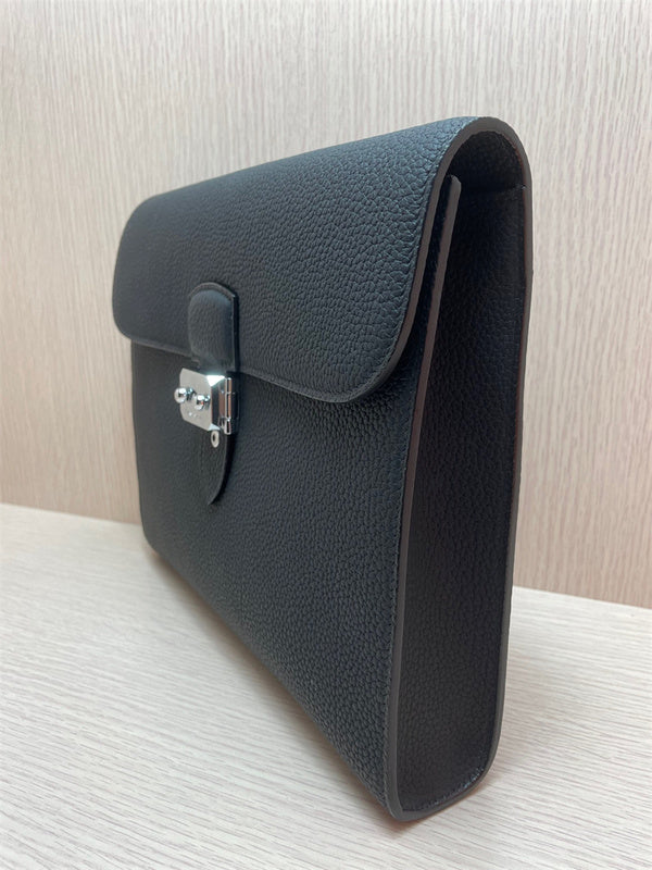  refined top-handle bag styled with outfit