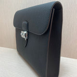  refined top-handle bag styled with outfit