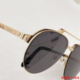 Close-up detail view of Cartier unisex sunglasses