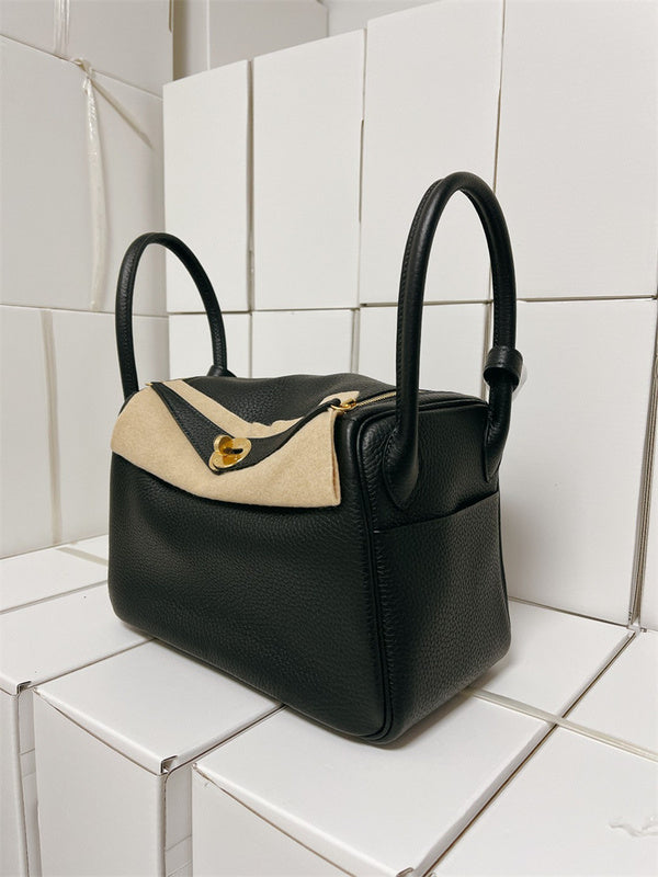  Contemporary satchel carried on shoulder