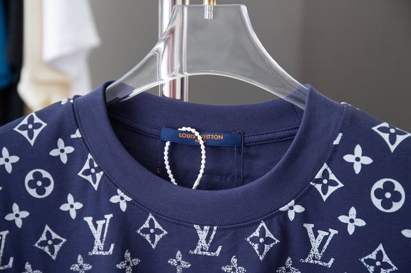 Close-up detail shot of Louis Vuitton cotton t-shirt with signature branding