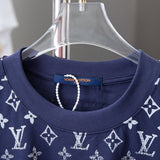 Close-up detail shot of Louis Vuitton cotton t-shirt with signature branding