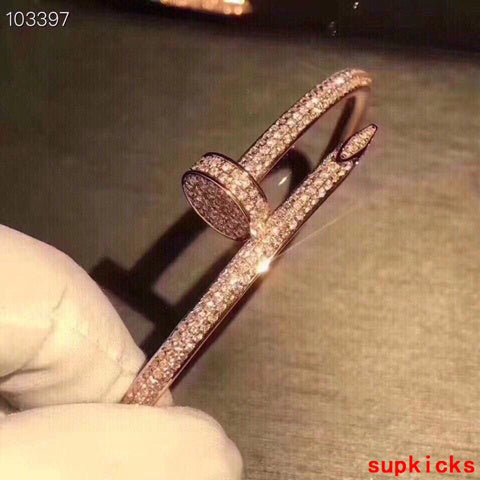 Angled view of Cartier unisex jewelry piece