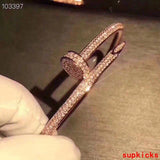 Angled view of Cartier unisex jewelry piece