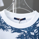 Close-up detail shot of Louis Vuitton cotton t-shirt with logo-detail design