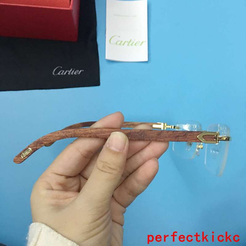 Angled view of Cartier unisex sunglasses