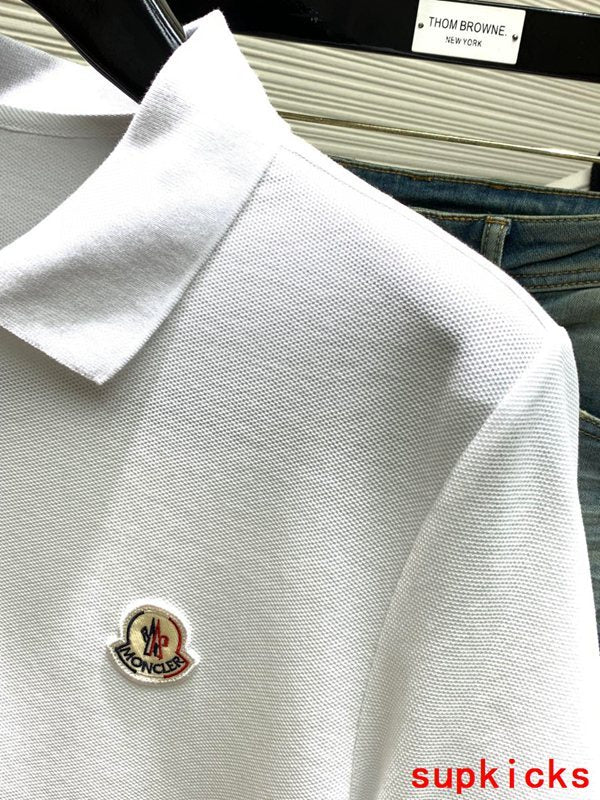 Full styled look of Moncler luxury clothing with signature branding