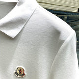 Full styled look of Moncler luxury clothing with signature branding