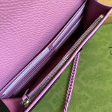 Side profile of signature statement women's handbag – women's luxury accessory