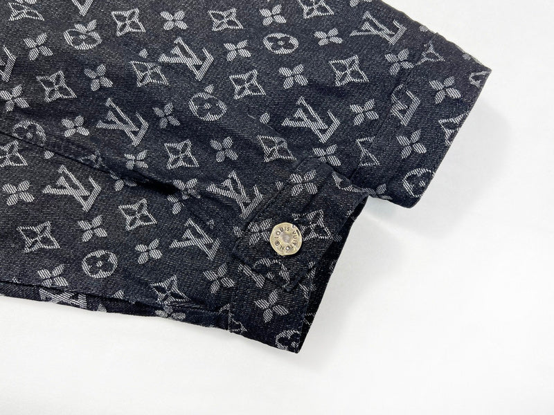 Close-up detail shot of Louis Vuitton luxury clothing with signature branding