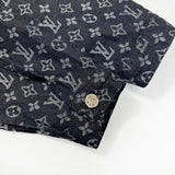 Close-up detail shot of Louis Vuitton luxury clothing with signature branding