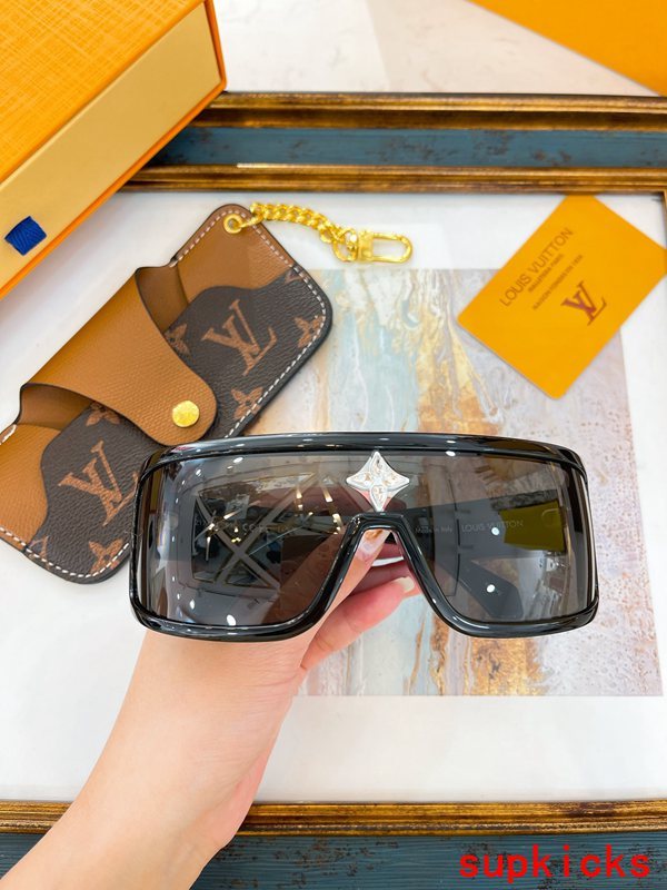 Close-up detail view of Louis Vuitton unisex sunglasses