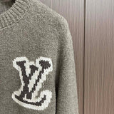 Full styled look of Louis Vuitton luxury clothing with monogram-inspired silhouette