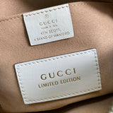 Side profile of refined structured women's handbag – women's luxury accessory