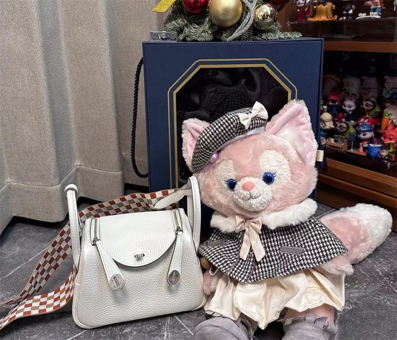 Side view of streamlined structured handbag