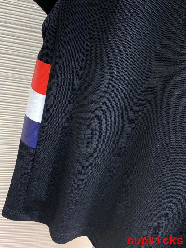 Back view of Moncler luxury clothing with signature branding