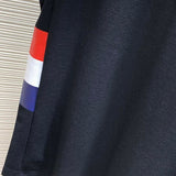 Back view of Moncler luxury clothing with signature branding