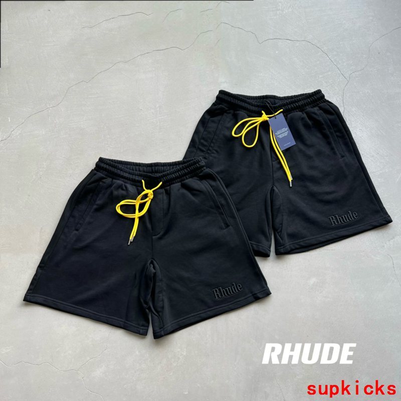 Front view of Rhude luxury clothing with monogram-inspired silhouette