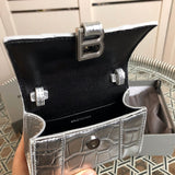 Side profile of elevated statement women's handbag – women's everyday handbag