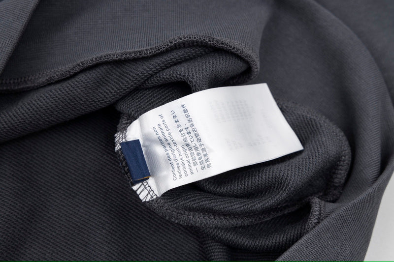 Close-up detail shot of Louis Vuitton luxury clothing with contemporary cut
