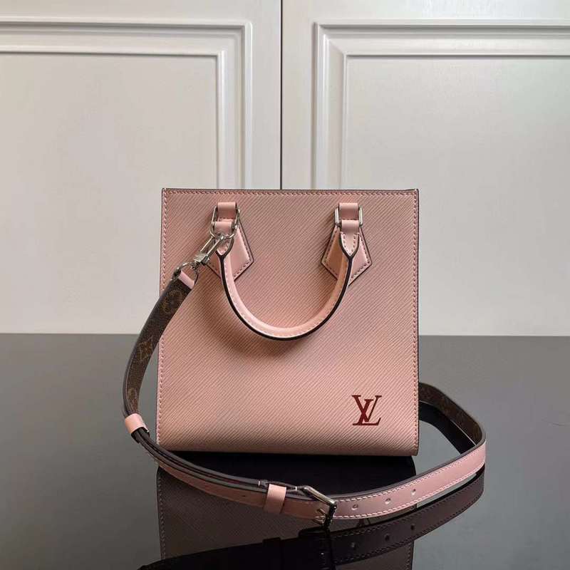 Side profile of structured classic women's handbag – women's luxury accessory