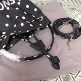 Styled lifestyle shot of polished elevated women's handbag – women's luxury accessory