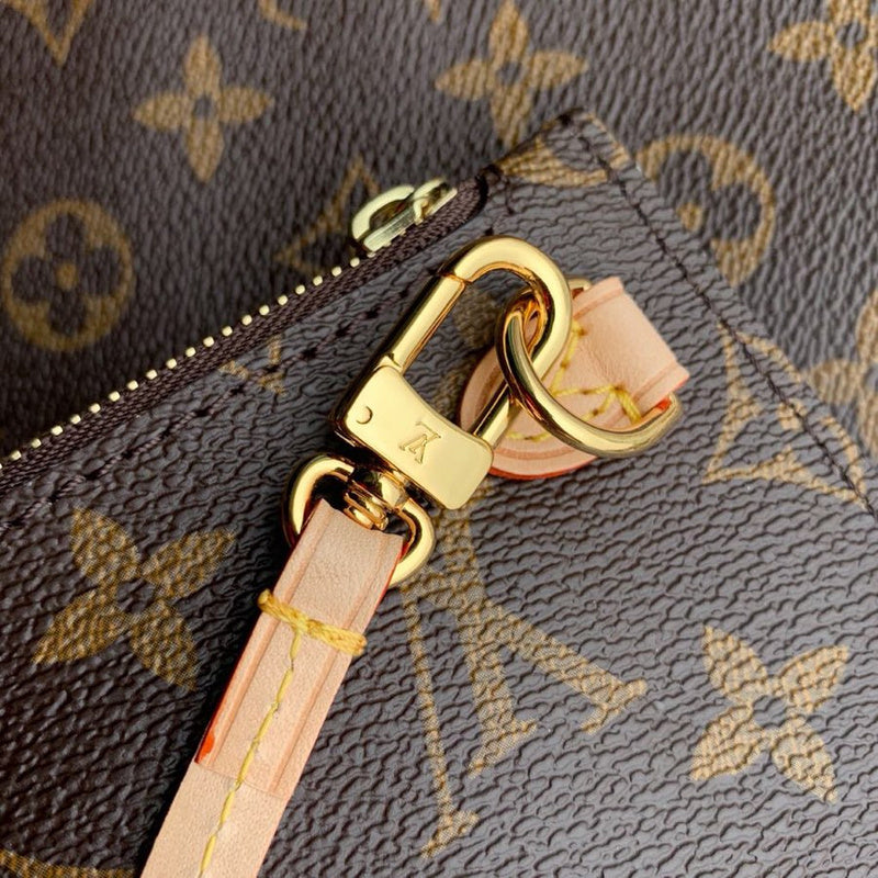 Handle and strap detail of refined everyday-luxe women's handbag – women's statement bag