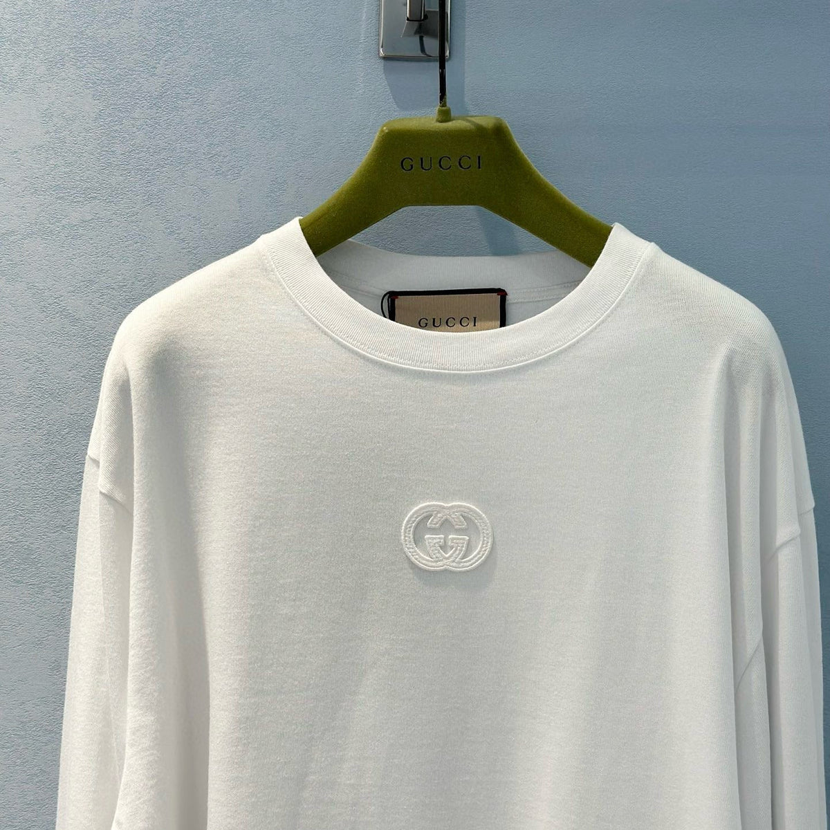 Side profile of Gucci T-Shirt showcasing structured silhouette