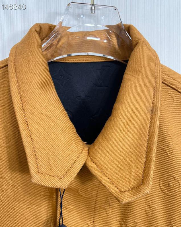 Close-up detail shot of Louis Vuitton luxury clothing with tailored silhouette