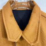 Close-up detail shot of Louis Vuitton luxury clothing with tailored silhouette