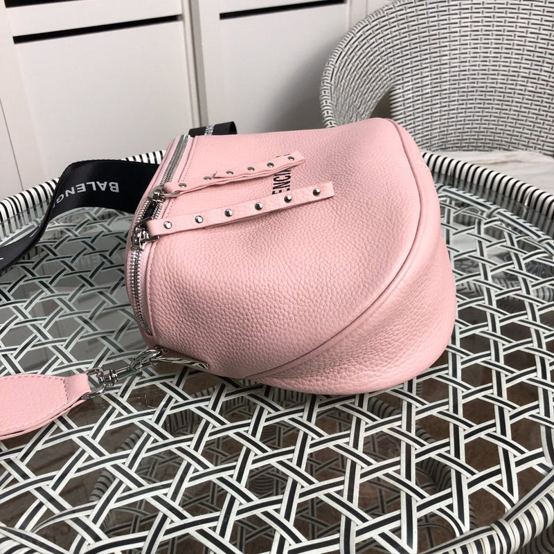 Styled lifestyle shot of structured signature women's handbag – women's luxury handbag