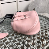 Styled lifestyle shot of structured signature women's handbag – women's luxury handbag