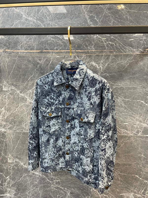 Close-up detail shot of Louis Vuitton luxury clothing with logo-detail design