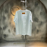 Side profile of Louis Vuitton cotton t-shirt with runway-inspired design