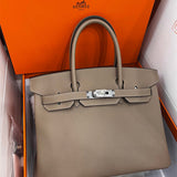  Understated top-handle bag front view