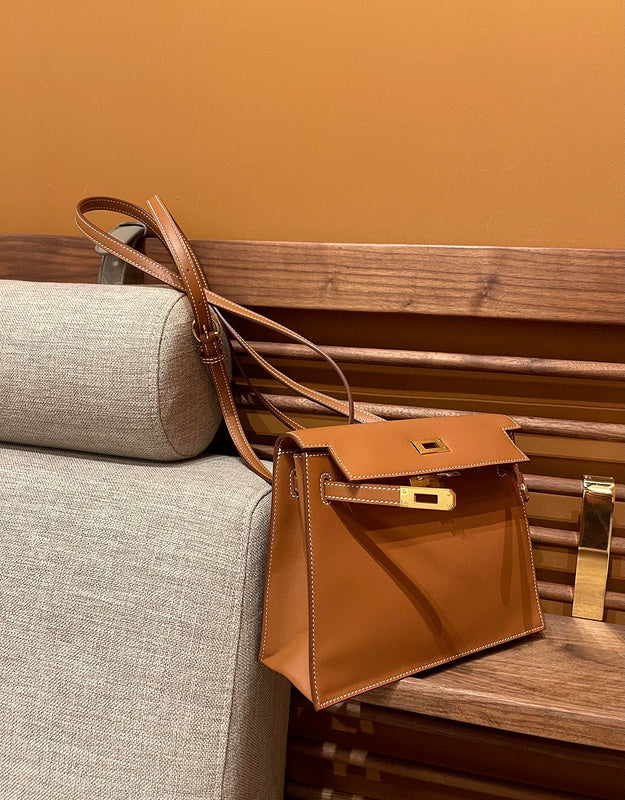 Side view of sculpted structured handbag