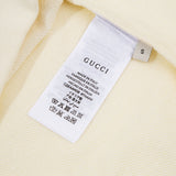 Close-up detail shot of Gucci luxury clothing with streetwear-inspired cut