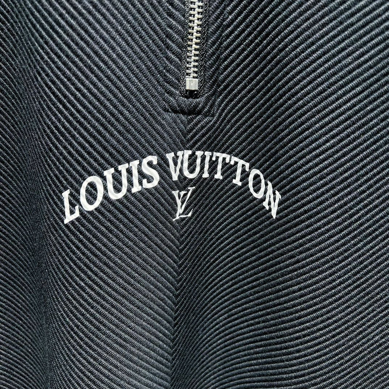 Full styled look of Louis Vuitton luxury clothing with monogram-inspired silhouette