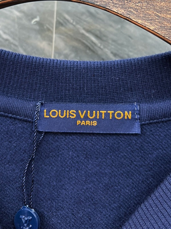 Side profile of Louis Vuitton luxury clothing with tailored silhouette