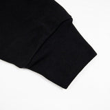 Side profile of Louis Vuitton luxury clothing with logo-detail design