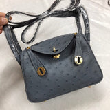 Side view of curated structured handbag